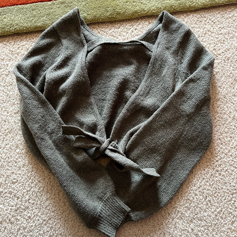 two backless sweaters